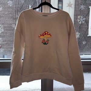 Chic Cream Sweater with Mushroom Embroidery